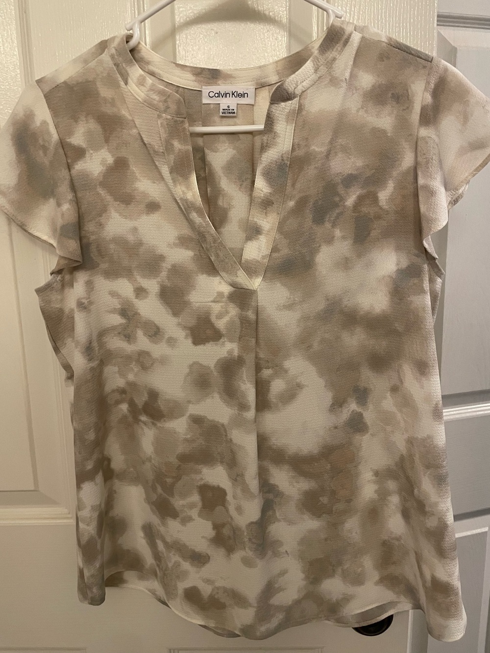 Calvin Klein cap sleeve blouse size S, cream/ brown pattern, like new